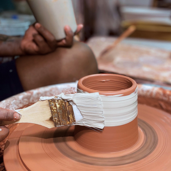 1 Cover the outside of the cylinder with an even coat of a contrasting slip.