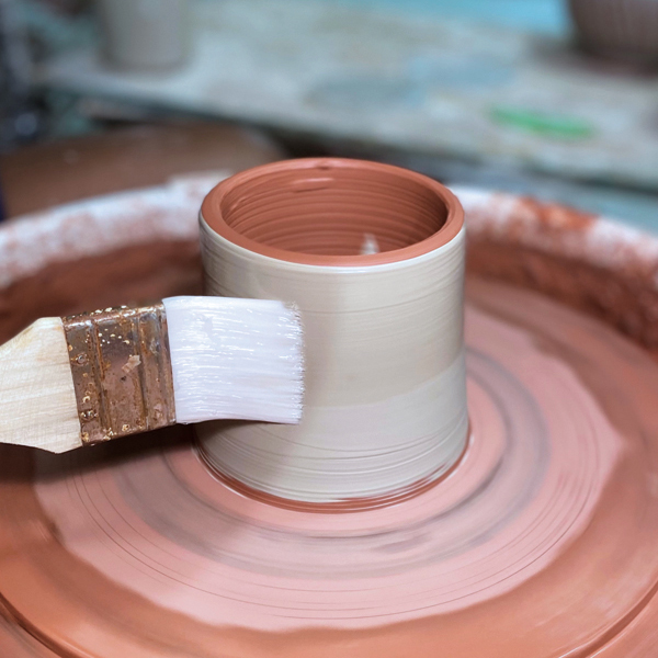 2 Brush a thin layer of sodium silicate onto the exterior and allow it to dry for 15–20 seconds. 