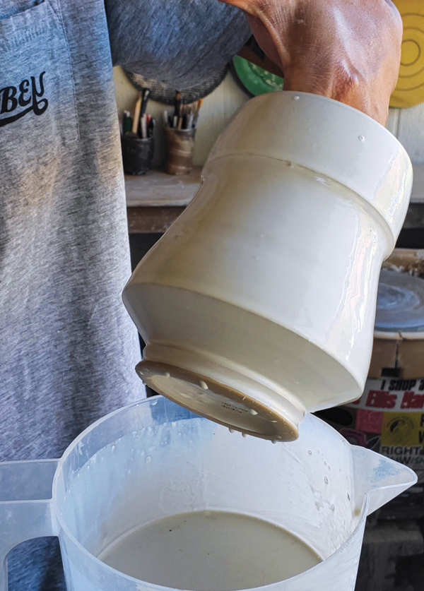 2 Dip the pot into flashing slip, then let it set up to the point where it is still wet but won’t run down the surface.