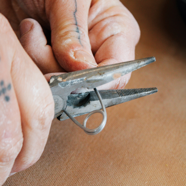 2 Leave at least ½ inch of straight wire on each end to insert into the piece.
