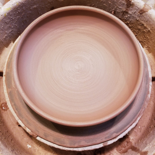 3 Make sure the inside of the pasta plate is smooth and compressed before taking it off the wheel.