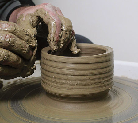 3 Open the form to create a diameter of 5–6 inches, then raise the walls 4–5 inches.