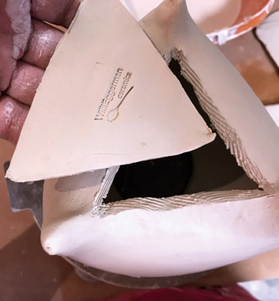 6 Cut a slab to fill the triangular opening between the feet. 