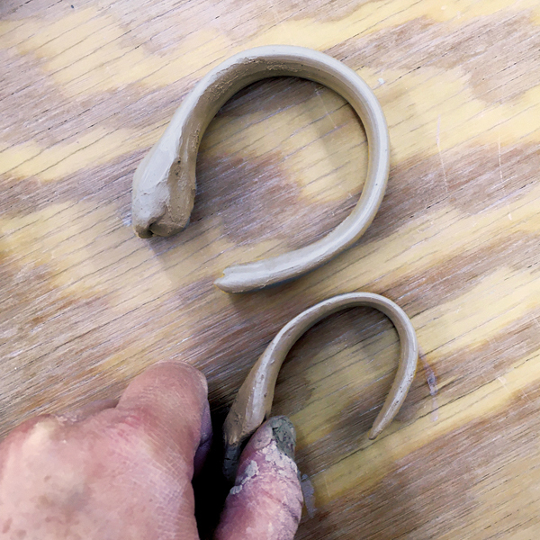 6 Pull two handles and lay them out to dry in a question-mark shape.