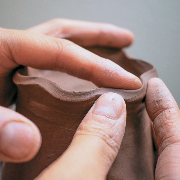 7 Add a ½-inch strip to create a foot ring, then add undulations to the foot.