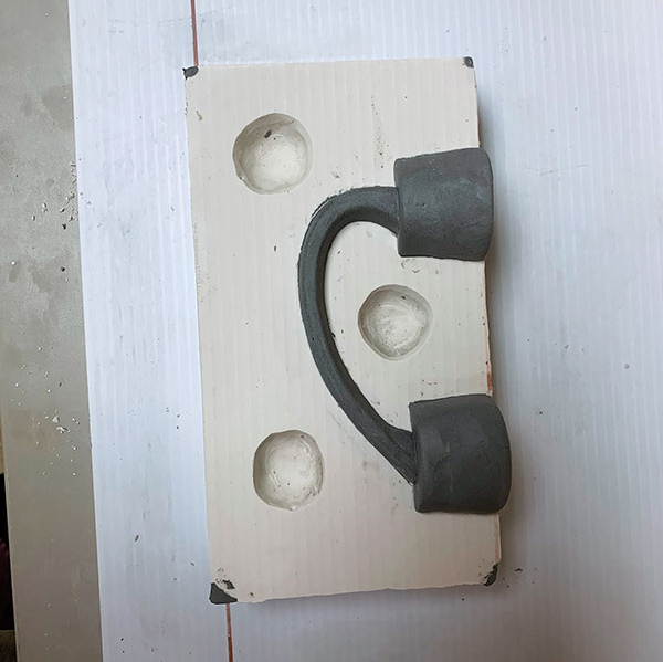 7 Carefully reattach the remaining half of the handle and sprue pieces.  