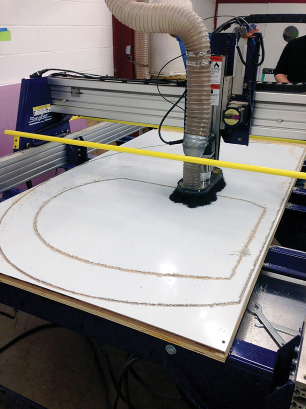 CNC routing a side wall.