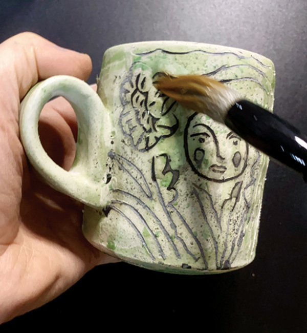 4 Apply glaze inlay in circular brush strokes to get into the fine grooves.