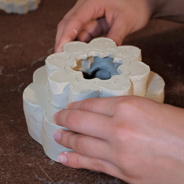 8 Slip and score the pieces that will be joined together.