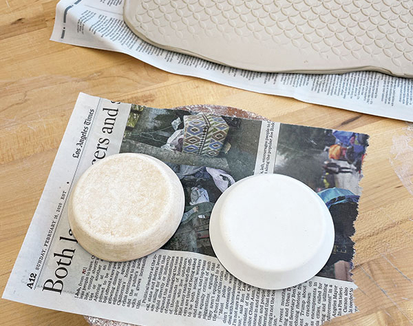 10 Place a textured slab over two round drape molds to create the tray.
