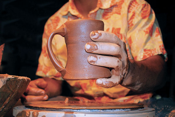 11 Clean up the mug as needed and refine the lower curve of the handle.