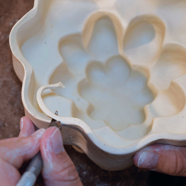 11 Use an X-Acto knife to bevel the rim of the cup. 