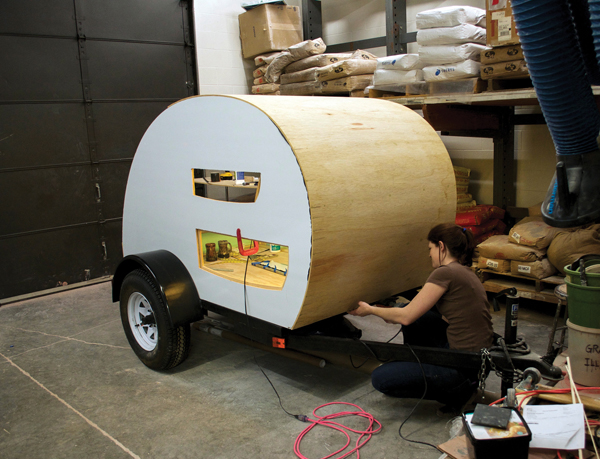 Sanding the front after attaching the plywood.