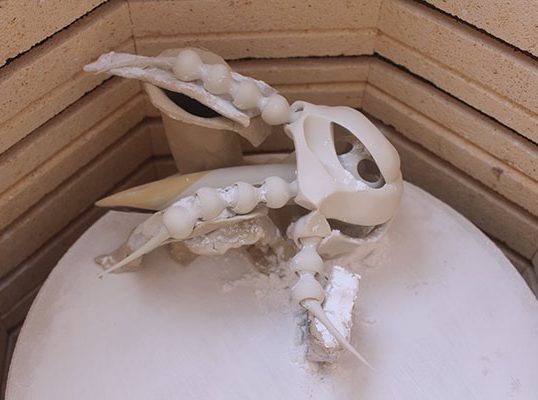 14 The final, fired work in the kiln, shown with the alumina-coated ceramic supports still in place.