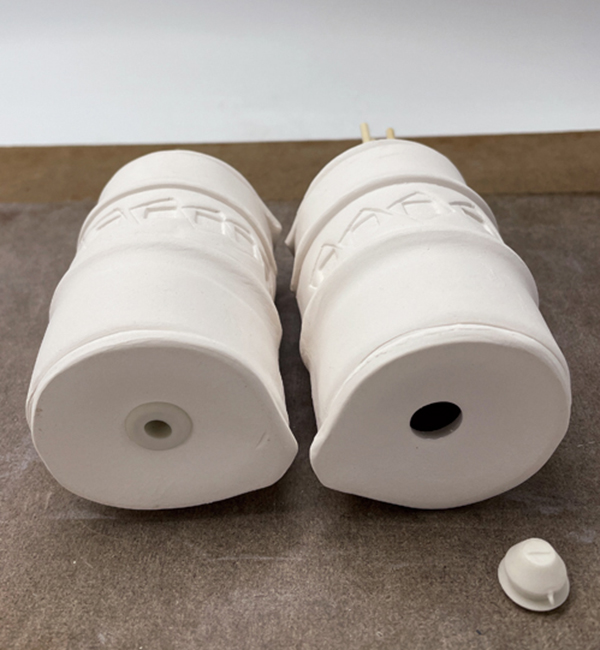 15 Plug the hole in the base of the shaker with a rubber stopper.