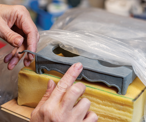 16 Add texture to the entire piece, then extrude flat, thin coils and attach them for added finishing details.