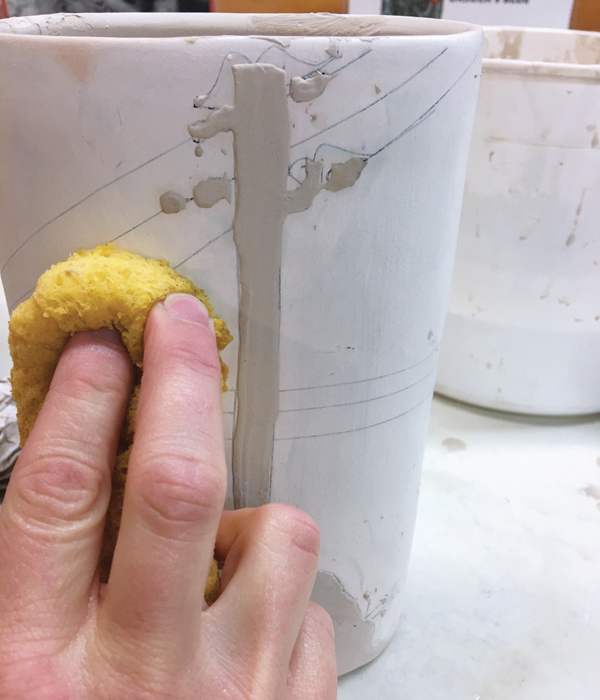 18 The glaze sticks only to the image. Use a damp sponge to clean up any beads of glaze from the bare surface prior to firing.
