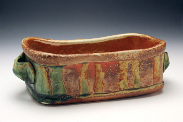Bread basket, 8½ inches (22 cm) in length, wheel-thrown and handbuilt porcelain, flashing slip, glaze, fired to cone 10 in a reduced wood/soda kiln, 2015.