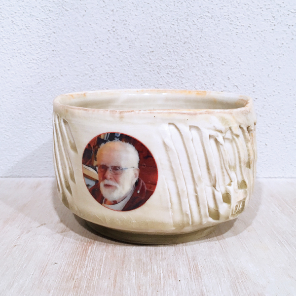 6 Mac Teabowl, 3 in. (8 cm) in height, wheel-thrown and paddled porcelain, Wirt’s Trap glaze, wood fired to cone 10, decal fired to cone 017, 2020. 