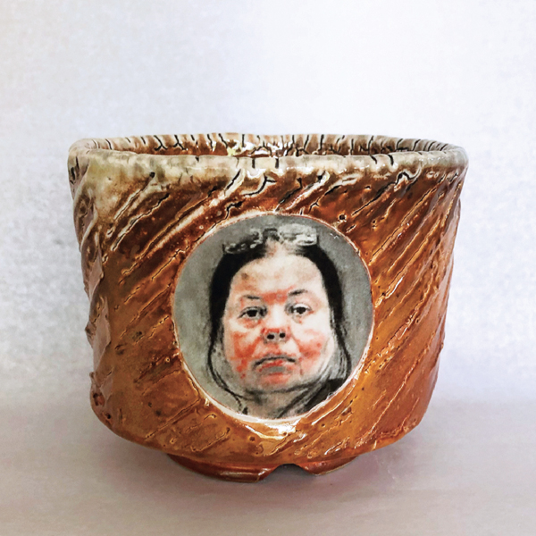 5 Viola Frey Teabowl, 4½ in. (11 cm) in height, wheel-thrown and paddled porcelain, Tom’s Shino glaze over Oestreich’s Crackle White Slip, wood fired to cone 10, decals fired to cone 017, 2021. 