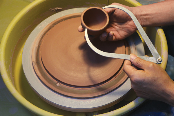 2 Measure the diameter of the inner bowl using calipers.