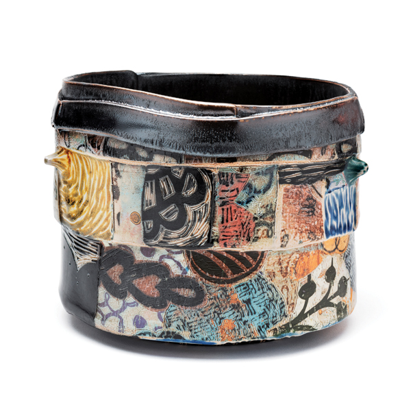 Collage bowl, 6½ in. (17 cm) in height, slab-built stoneware, colored slips, screen-printed underglaze, soda fired to cone 7, 2022. Photo: Loam.