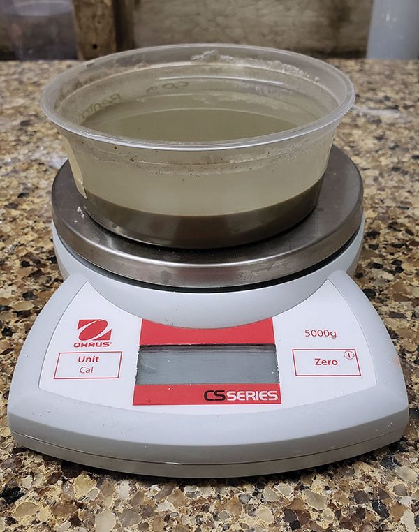 4 Allow the mixture to sit untouched until the bentonite is fully submerged.