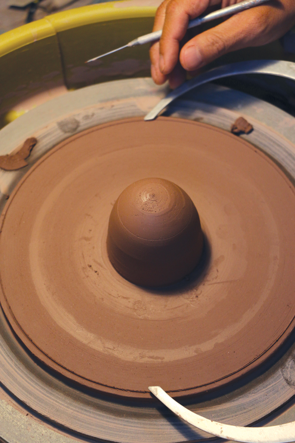 4 Score, slip, and attach the smaller bowl to the plate, then measure the outside diameter of the larger bowl using calipers, and transfer this measurement to the plate.