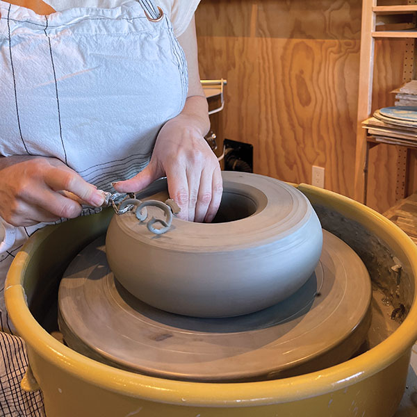 7 Turn the donut upside down, trim the base so it’s round, and poke an air hole.