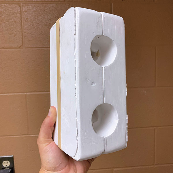9 Use a rubber band to keep the finished mold halves together as they dry. 
