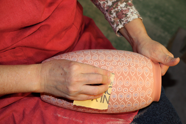 9 Between bisque and glaze firings, smooth the surface with 320-grit sandpaper.