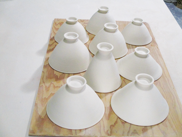 2 Keep plenty of bowls on hand from which to cut from. Select one to be the foundation of the sculpture.