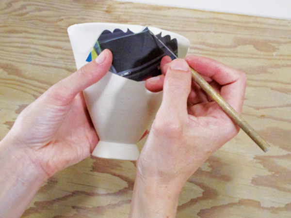 6 Trace the template onto the bowl to create guidelines for cutting.