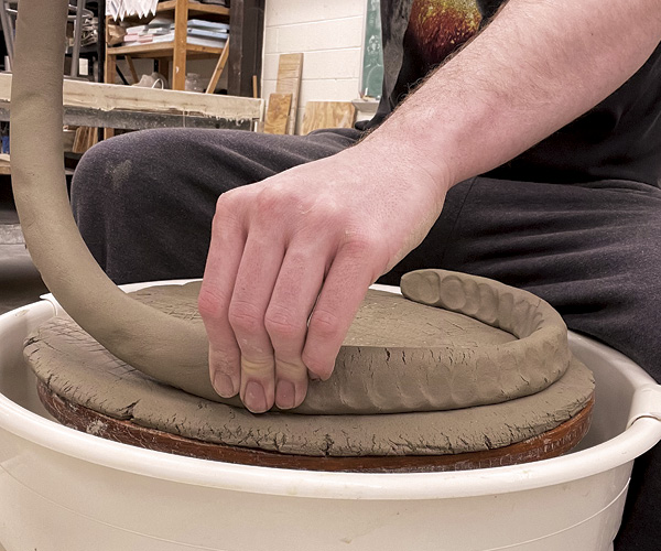 1 To make your plaster hump mold, begin by attaching a 1-inch (2.5-cm)-thick coil to slab base.