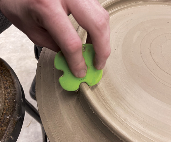 9 Throw and refine the foot of the platter.
