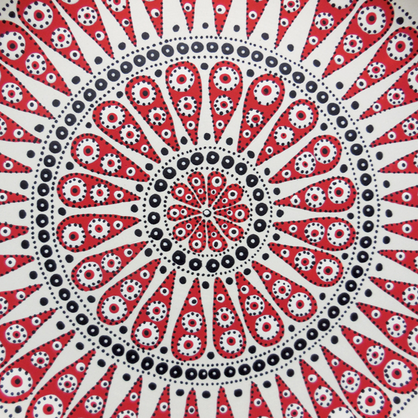 9 Detail of the bisqued-fired platter show- ing the way the shapes expand as they move out from the center.