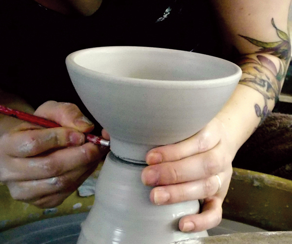 2 When you’re satisfied with the size and the shape, use a needle tool to remove the bowl from the hump.