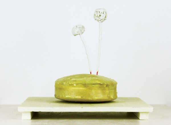 2 Amanda Salov’s Tandem, 12 in. (30 cm) in height, porcelain fired to cone 6, beeswax, wood, 2014.