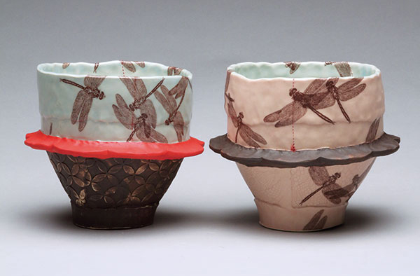 Skirted cups, to 5 in. (13 cm) in height, draped and pinched white clay with underglazes, glazes, decals, fired to cone 5, 2020.