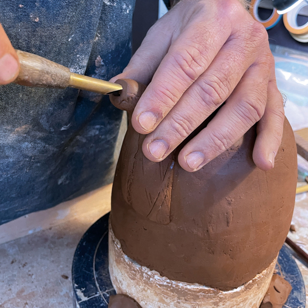 13 Cut or refine the opening in the end of the spout with a hole cutter, leaving a semi-sharp line on the bottom inside edge to cut the water flow when in use (to prevent drips).
