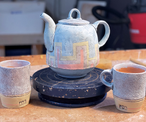 Pre-fired pieces waiting for their next time in the kiln.