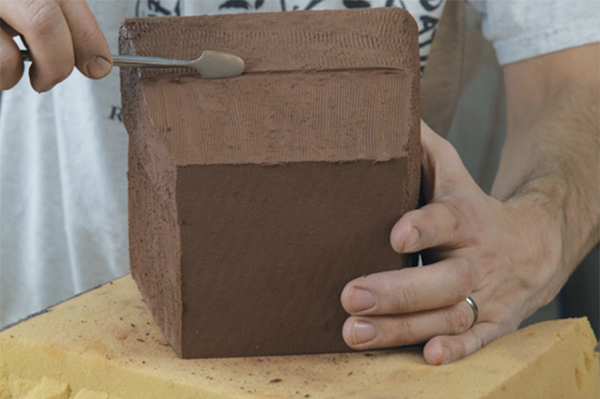 14 After carving, refine the edges of the carved areas.