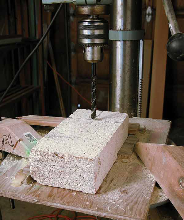 1 Use a drill press and a masonry bit to drill holes for the threaded rod.