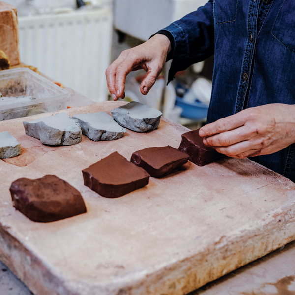 1 Cut off chunks of equal sizes and weights of two compatible, contrasting colored clay bodies. 