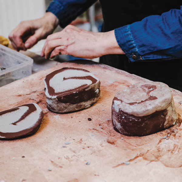 4 Completing 4 wedges of the clay starts to slightly marble the stacks of combined clay bodies.
