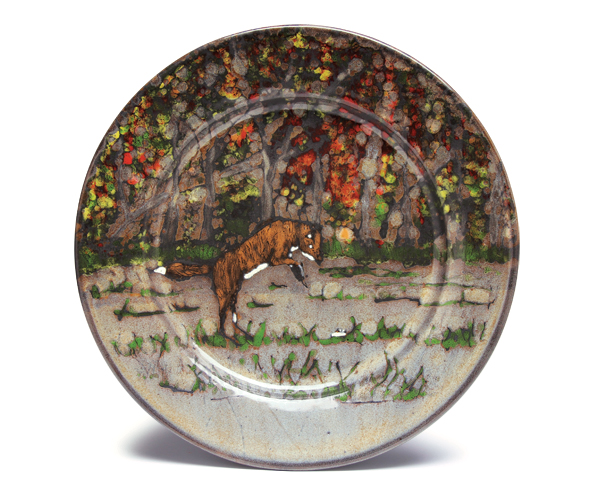 1 Pouncing Fox Plate, 11 in. (28 cm) in length, red stoneware, multiple glaze layers, wax resist, fired to cone 6 in oxidation, 2020. 