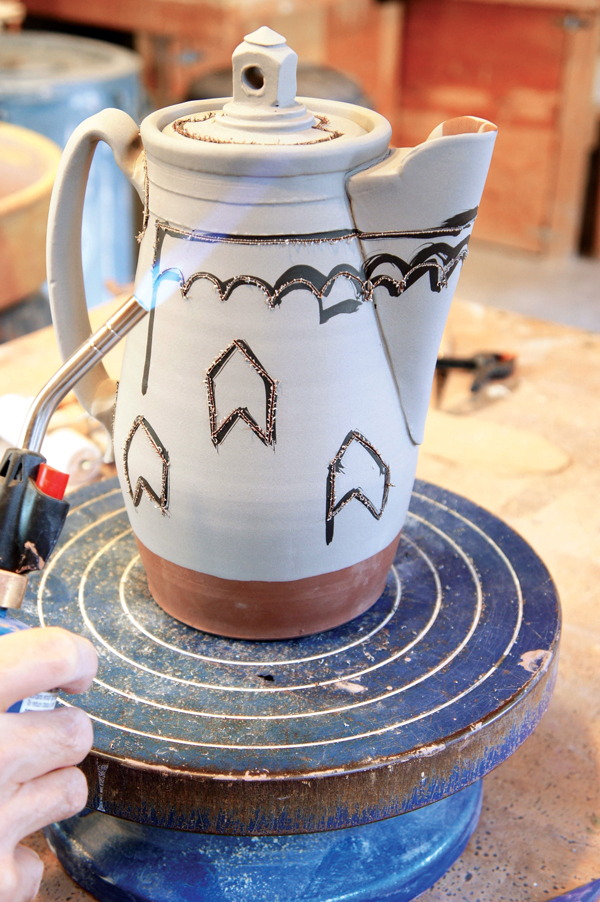 10 After the drawing is finished, use a propane torch to heat the burrs and then remove them with a stiff brush.