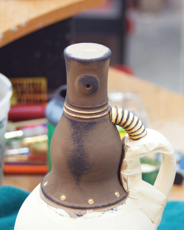 16 Add underglaze for texture, then wax the neck. Coat the interior with a liner glaze.