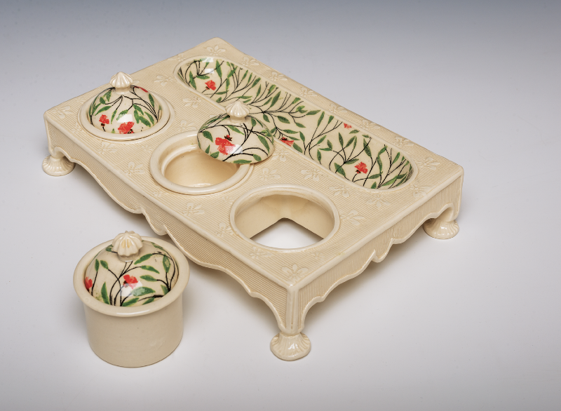 A handmade ceramic box or stand with storage compartments can be a special place to store keepsakes—objects with sentimental value or that have a sense of preciousness. 
