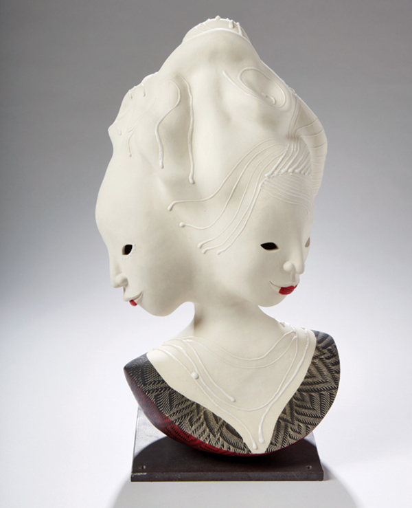 3 Mari Ogihara’s Rouge, 20 in. (51 cm) in height, clay, glazes, metal stand, 2022. 